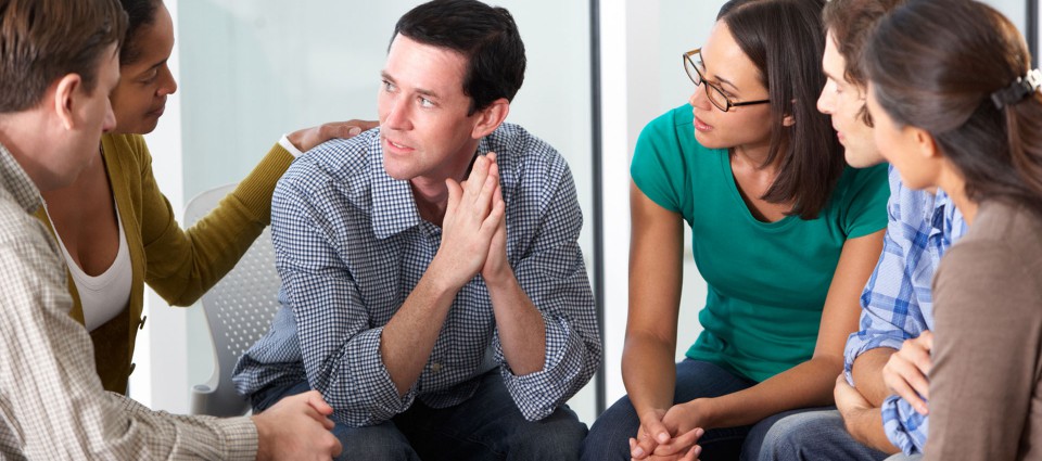 Man comforted after finding out he is HIV positive